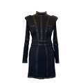 Mini black dress with gold details and shoulder pads