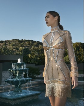 Sparkling dress with silver and gold details and cross on skirt